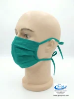Mascarilla de tela plana con amarres en DRIL Verde Clinico Mascarilla de tela plana con amarres en DRIL Verde Clinico